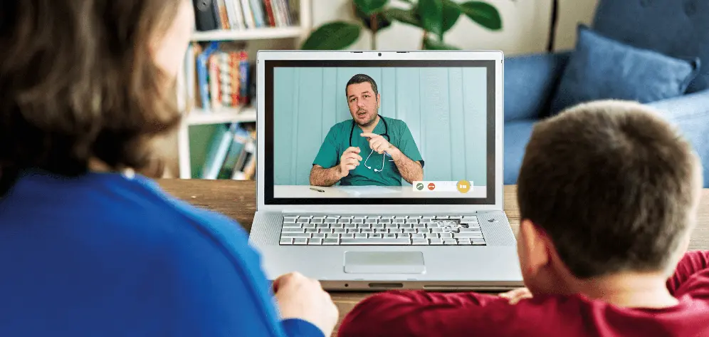 Virtual consultation at home between a patient and a healthcare professional.